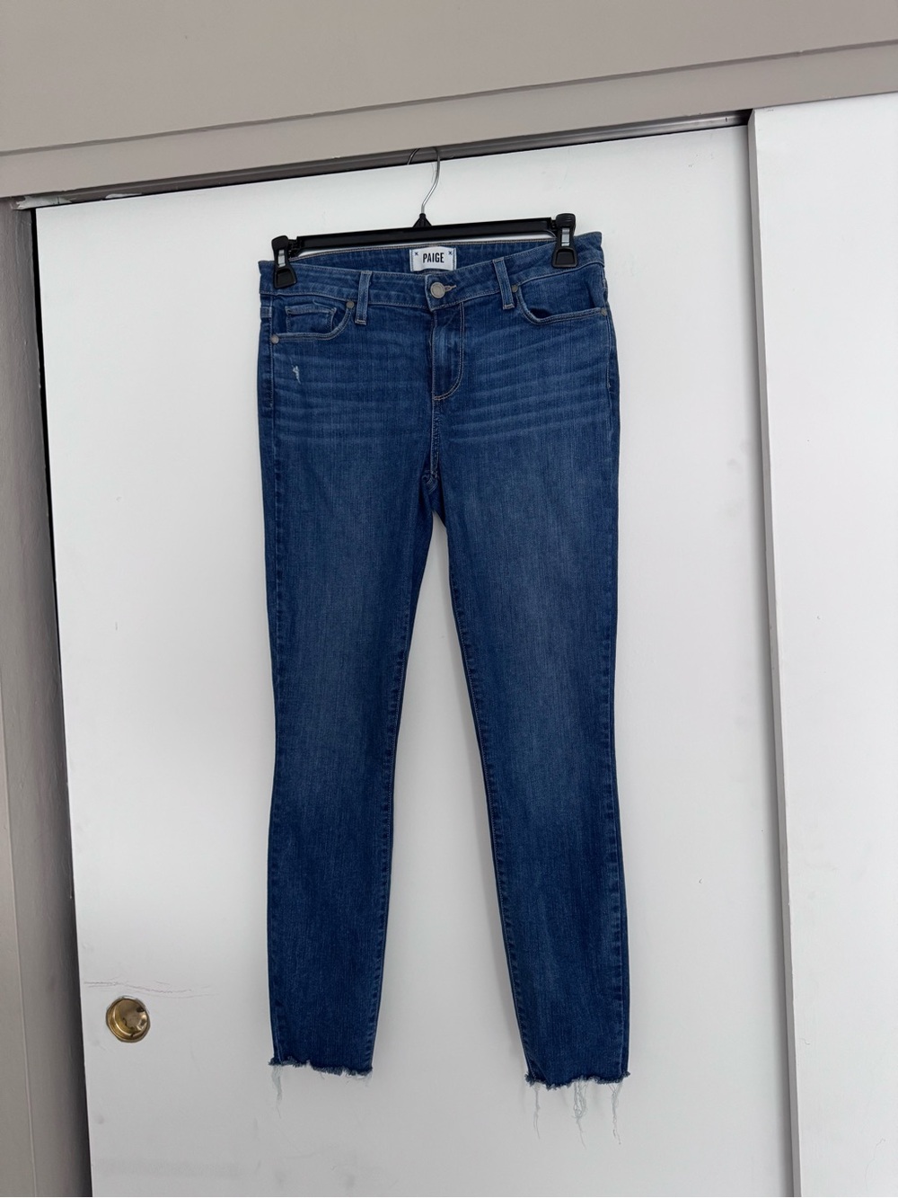 PAIGE Skinny Jeans in Dark Blue Denim with Frayed Hem